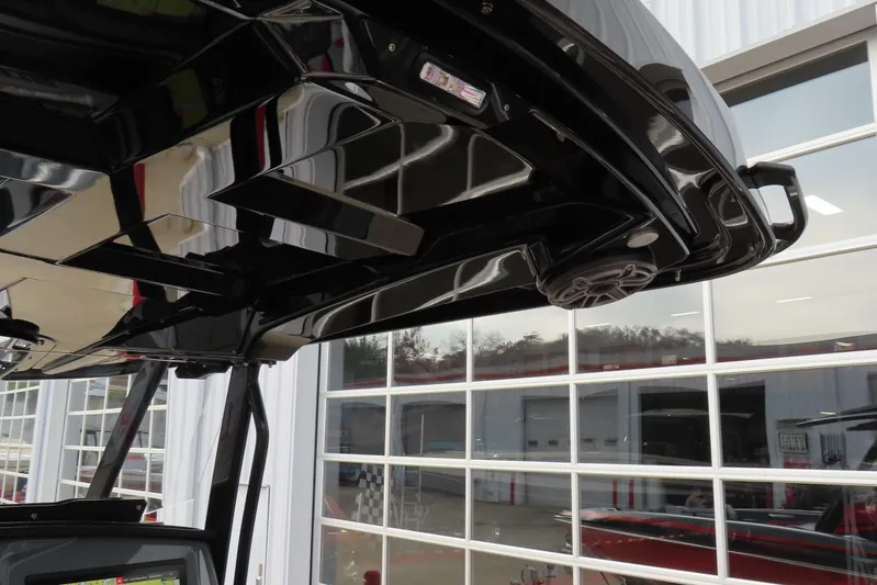  Yacht Photos Pics 2025 Sunsation 32 CCX boat interior with sleek black design and modern features.