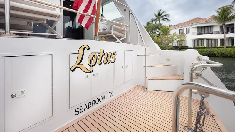  Yacht Photos Pics 1998 Hatteras 74 Sport Deck Motor Yacht docked, featuring "Lotus" name and Seabrook, TX location.