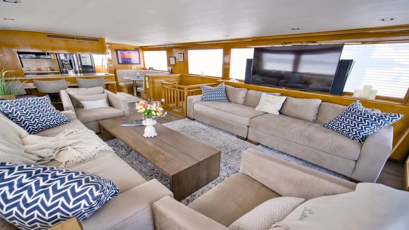  Yacht Photos Pics Luxurious interior of 1998 Hatteras 74 Sport Deck Motor Yacht with modern furnishings.