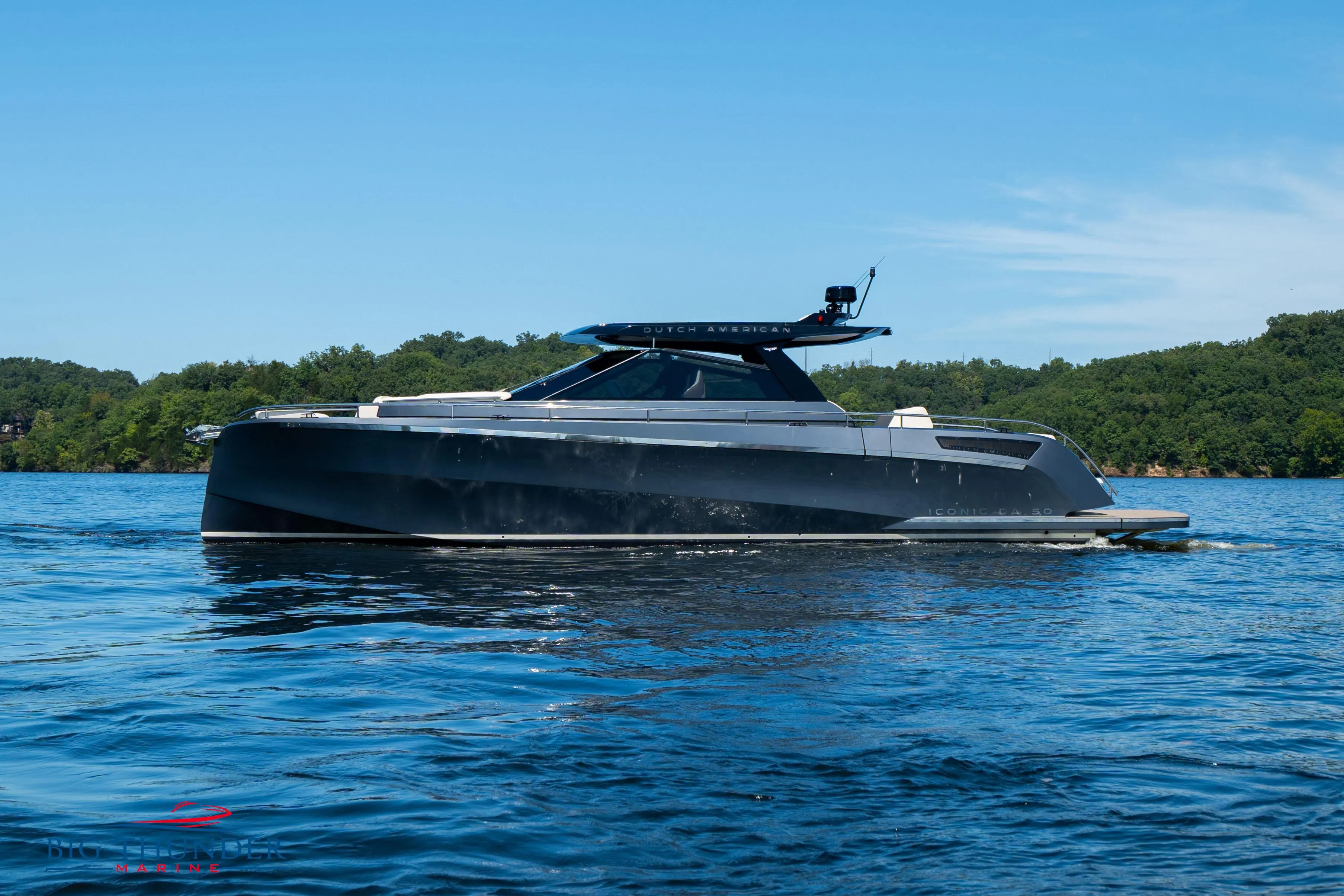 2024 Dutch American Iconic DA 50 yacht on serene blue water.