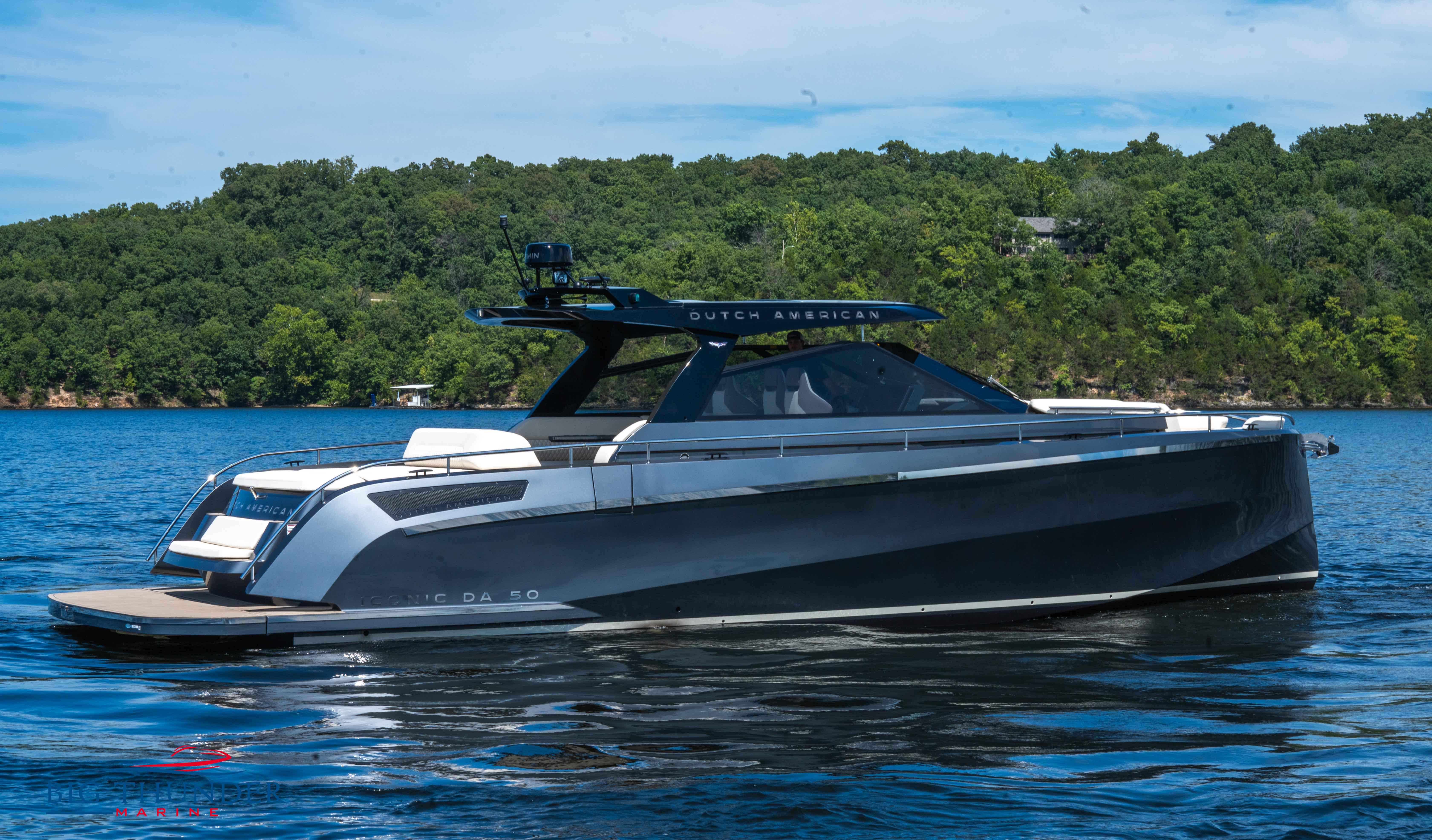 2024 Dutch American Iconic DA 50 yacht on a serene lake.