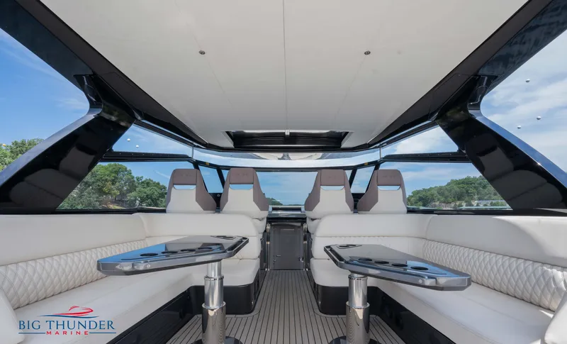  Yacht Photos Pics Luxurious interior of 2024 Dutch American Iconic DA 50 yacht with sleek seating and tables.