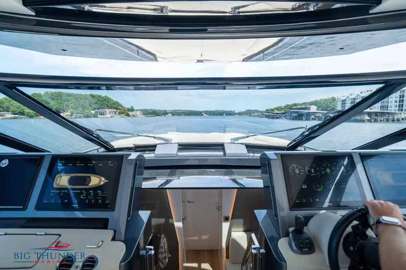  Yacht Photos Pics Interior view of 2024 Dutch American Iconic DA 50 yacht cockpit, overlooking serene waters.
