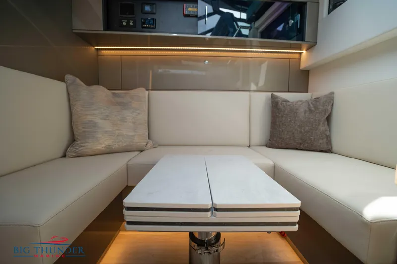  Yacht Photos Pics Luxurious interior of 2024 Dutch American Iconic DA 50 yacht with plush seating and table.