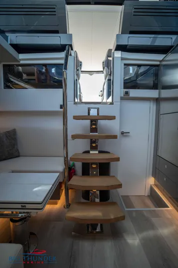  Yacht Photos Pics Interior of 2024 Dutch American Iconic DA 50 yacht with modern staircase and seating area.