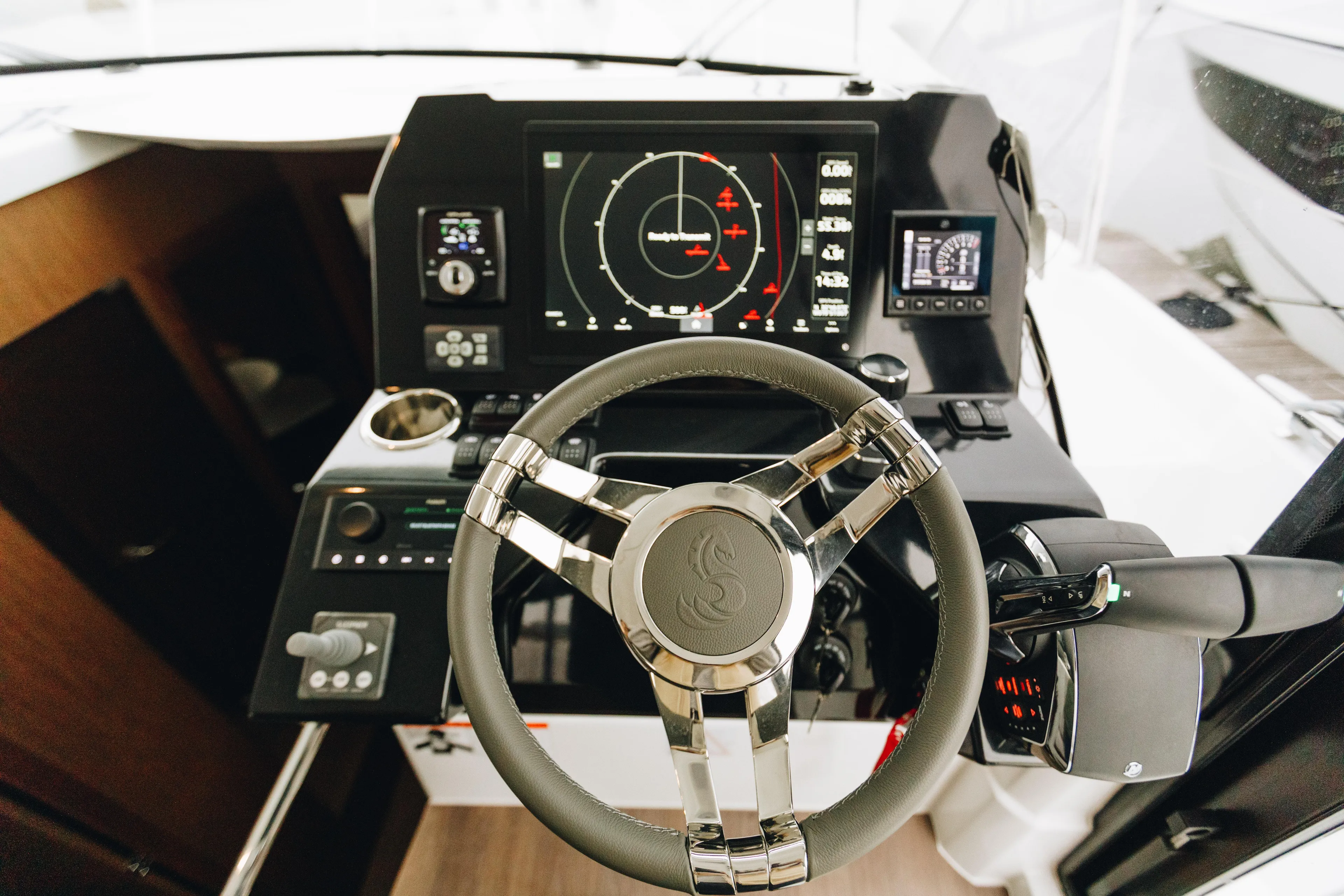  Yacht Photos Pics Steering console of 2026 Beneteau Antares 11 Fly with advanced navigation system.