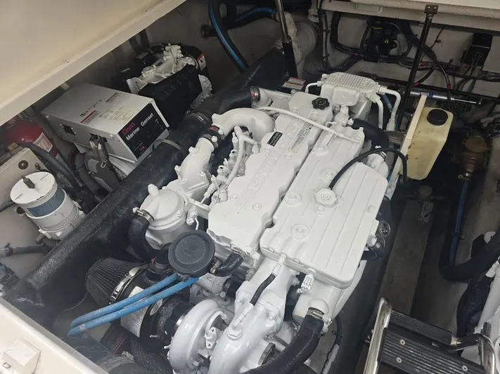  Yacht Photos Pics Engine room of 2008 Sea Ray 40 Sundancer, featuring a clean, well-maintained marine engine.