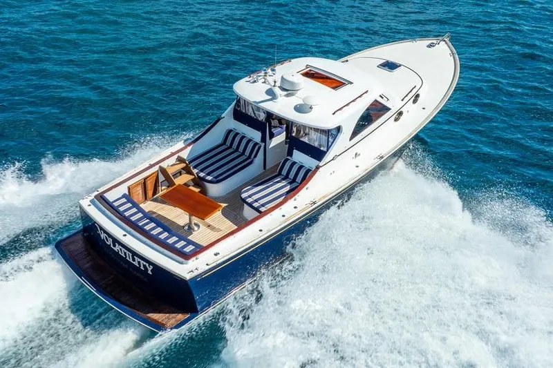 Volatility Yacht Photos Pics Luxury San Juan SJ 38 yacht cruising on blue ocean waters, 2003 model.