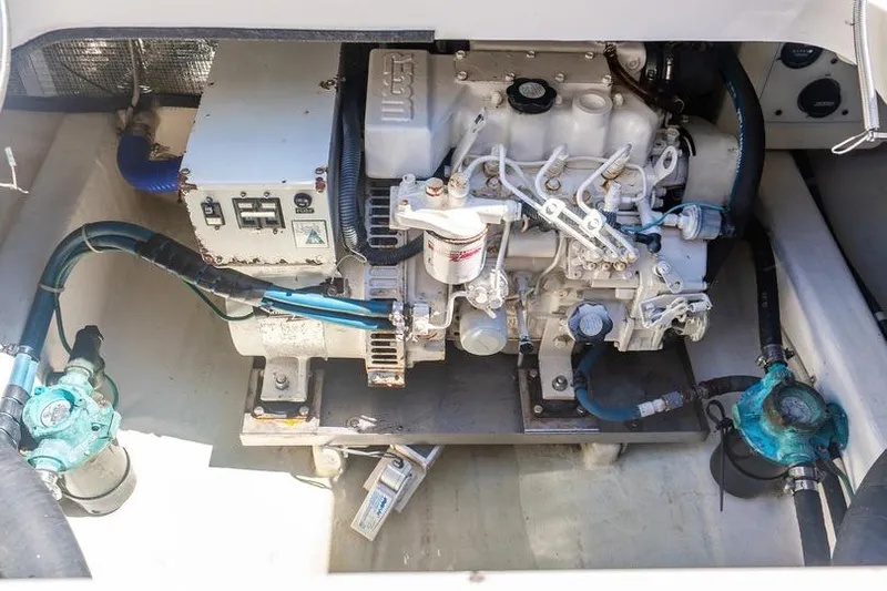 Volatility Yacht Photos Pics Engine compartment of a 2003 San Juan SJ 38 boat, showcasing mechanical components.