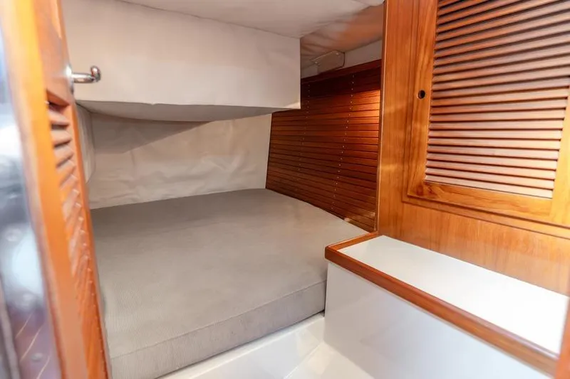 Volatility Yacht Photos Pics Cozy cabin interior of 2003 San Juan SJ 38 yacht with wooden accents.