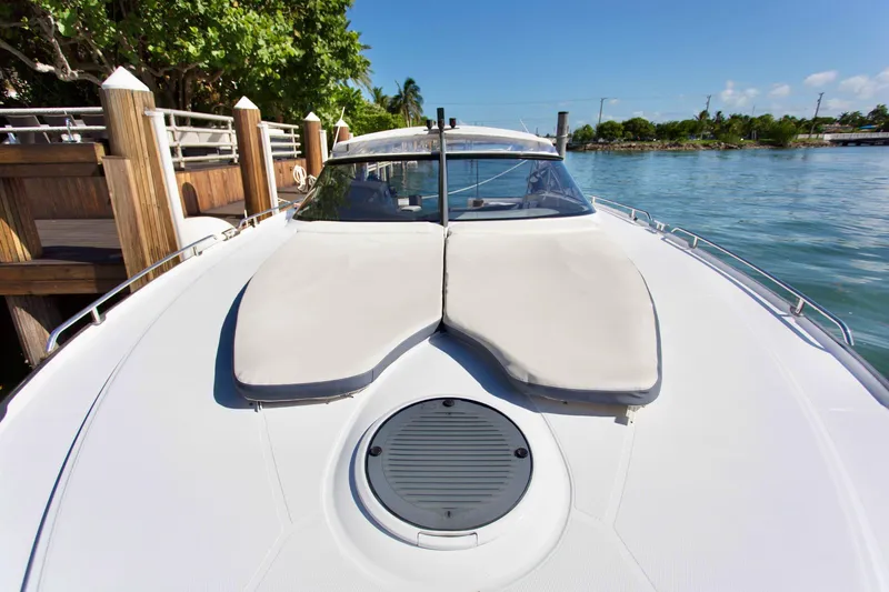  Yacht Photos Pics 2007 Baia BAIA ONE 43 yacht docked by a serene waterfront.