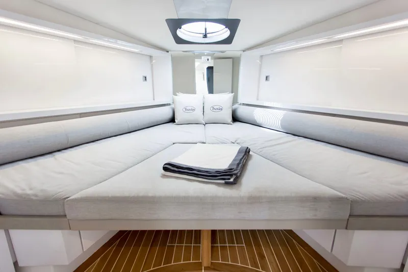  Yacht Photos Pics Luxurious interior of 2007 Baia BAIA ONE 43 yacht with elegant bedding.