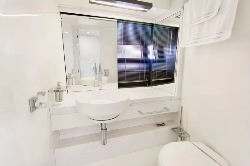  Yacht Photos Pics Luxurious bathroom in 2007 Baia BAIA ONE 43 yacht, featuring modern fixtures and sleek design.