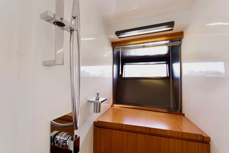  Yacht Photos Pics Luxurious bathroom interior of 2007 Baia BAIA ONE 43 yacht with modern fixtures.