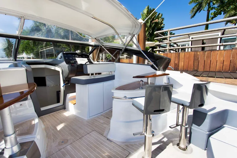  Yacht Photos Pics Luxurious 2007 Baia BAIA ONE 43 yacht interior with modern seating and sleek design.