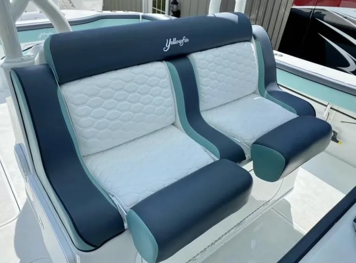  Yacht Photos Pics 2016 Yellowfin 39 boat seats with blue and white upholstery.
