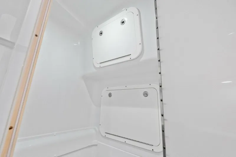 Midnight Rider Yacht Photos Pics Interior view of 2017 Yellowfin 42 Offshore boat storage compartments.