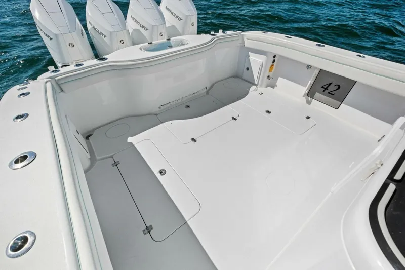 Midnight Rider Yacht Photos Pics 2017 Yellowfin 42 Offshore boat deck with Mercury engines, spacious and sleek design.