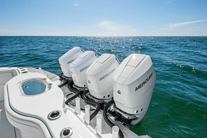 Midnight Rider Yacht Photos Pics 2017 Yellowfin 42 Offshore boat with four Mercury outboard engines on open sea.