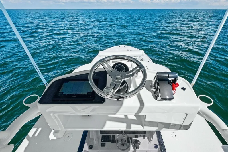 Midnight Rider Yacht Photos Pics 2017 Yellowfin 42 Offshore boat helm with ocean view.