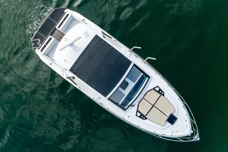Lux Life Yacht Photos Pics Overhead view of 2017 Cruisers Yachts 39 Express Coupe on water.
