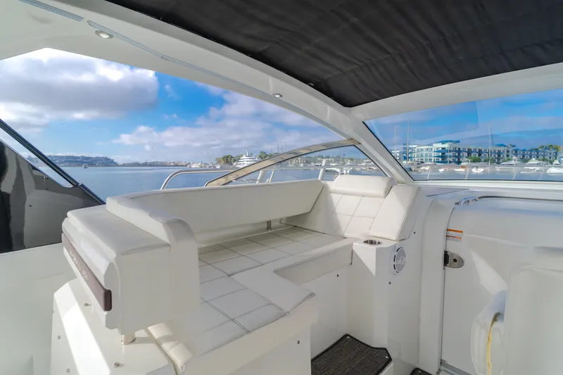 Lux Life Yacht Photos Pics 2017 Cruisers Yachts 39 Express Coupe interior with waterfront view.