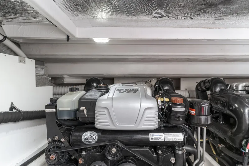 Lux Life Yacht Photos Pics Engine compartment of 2017 Cruisers Yachts 39 Express Coupe, featuring a powerful V8 engine.