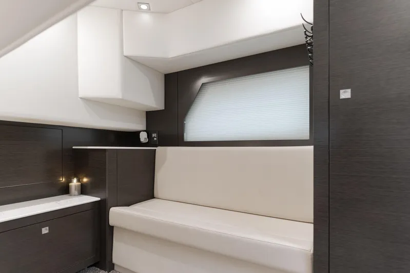 Lux Life Yacht Photos Pics Luxurious interior of 2017 Cruisers Yachts 39 Express Coupe with modern seating and sleek design.