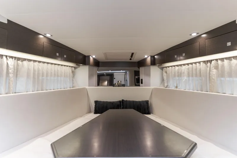 Lux Life Yacht Photos Pics Luxurious interior of 2017 Cruisers Yachts 39 Express Coupe with elegant seating and modern design.