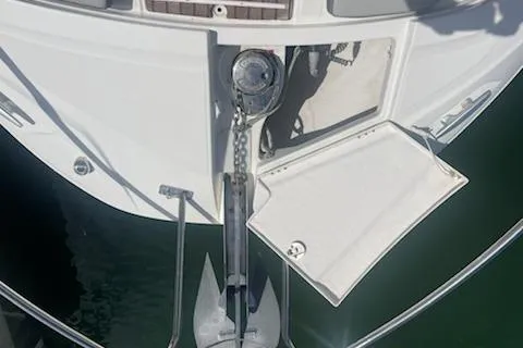 Yacht Photos Pics 2019 Jeanneau 9.0 WA boat anchor and chain mechanism on deck.