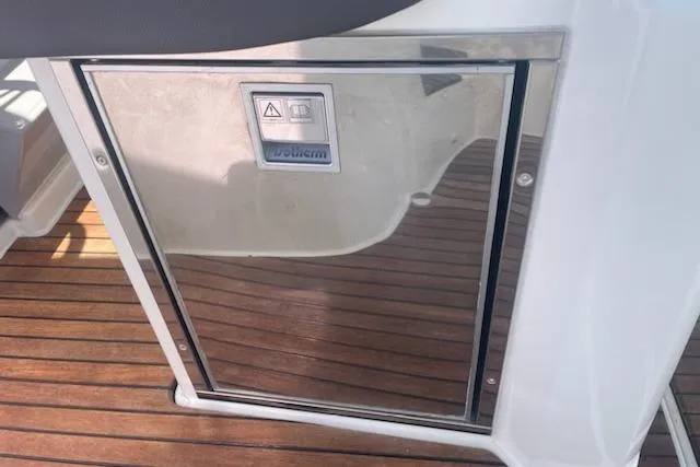  Yacht Photos Pics Stainless steel cabinet on Jeanneau 9.0 WA 2019 boat with wooden deck.