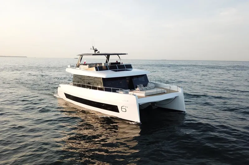  Yacht Photos Pics Luxury 2026 Moon Yachts 6ty catamaran cruising on open water.