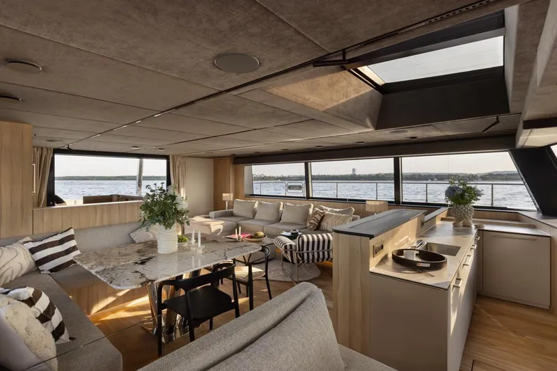  Yacht Photos Pics Luxurious interior of 2026 Moon Yachts 6ty with modern design and panoramic windows.