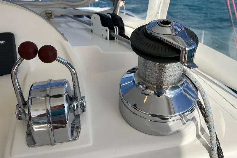 Mahi Mahi Yacht Photos Pics Sailing controls on a 2009 Leopard 46 yacht, featuring winch and throttle levers.