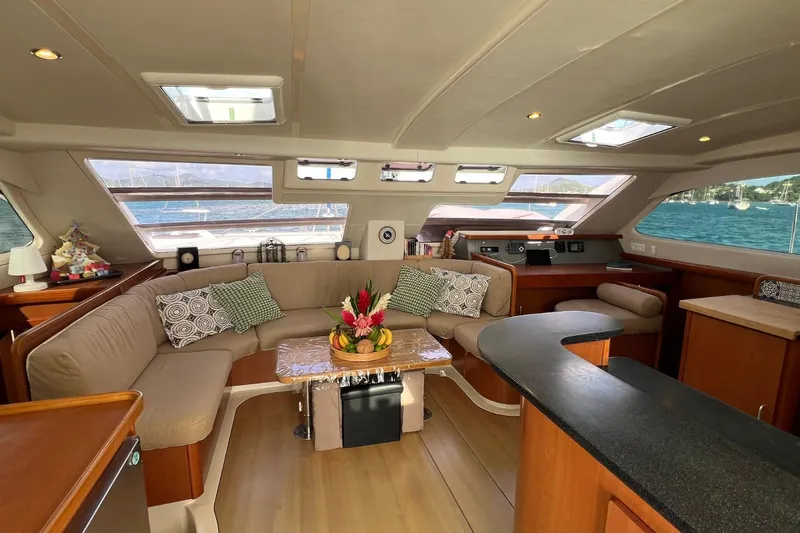 Mahi Mahi Yacht Photos Pics Luxurious interior of 2009 Leopard 46 yacht with elegant seating and ocean view.