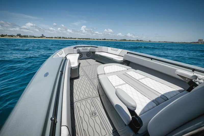 Deal Maker Yacht Photos Pics 2024 Contender 44ST boat interior on open water.