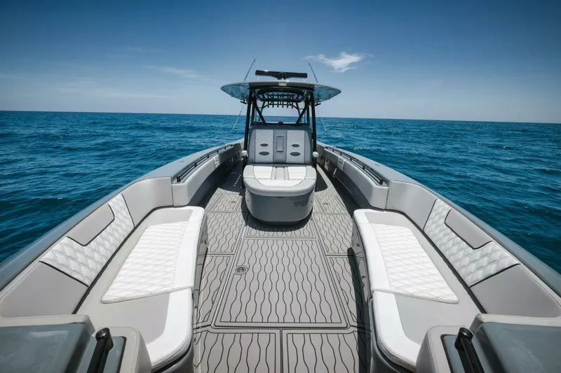 Deal Maker Yacht Photos Pics 2024 Contender 44ST boat interior on open water.