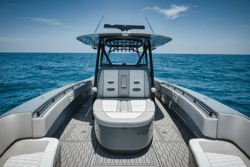 Deal Maker Yacht Photos Pics 2024 Contender 44ST boat interior on open ocean.