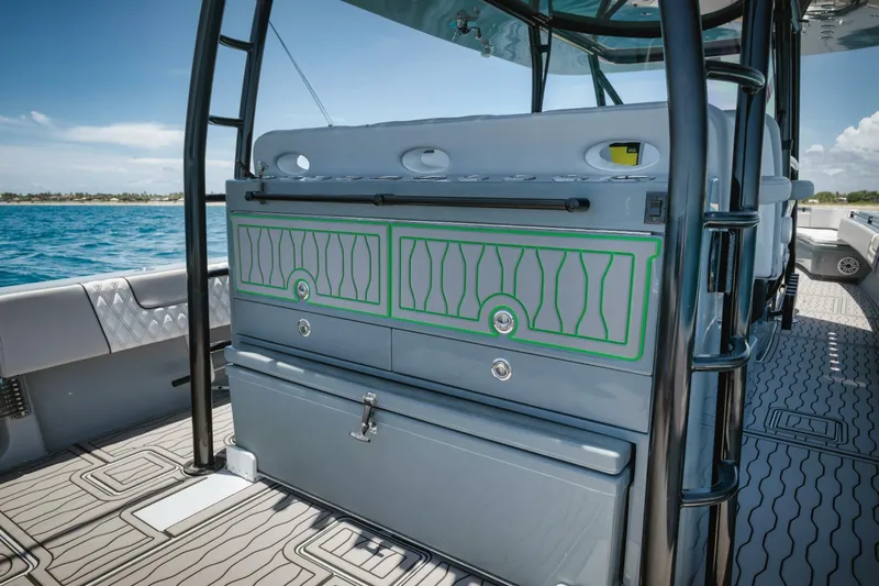 Deal Maker Yacht Photos Pics 2024 Contender 44ST boat interior with storage compartments.