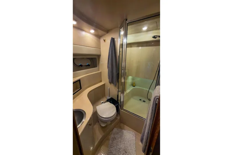 Daybreak Yacht Photos Pics Bathroom interior of 2002 Bayliner 3988 Command Bridge Motoryacht with shower and toilet.