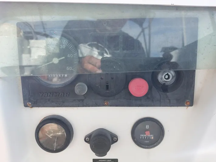 Wind & Wine Yacht Photos Pics Control panel of 2002 Beneteau Oceanis 42CC sailboat with Yanmar engine gauges.