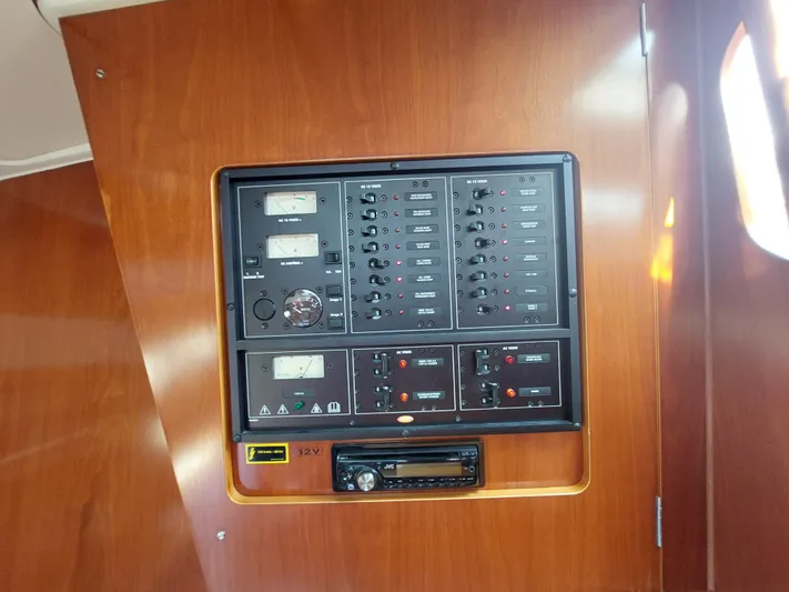Wind & Wine Yacht Photos Pics Electrical control panel on 2002 Beneteau Oceanis 42CC sailboat.