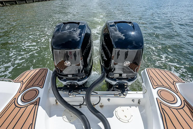  Yacht Photos Pics 2018 Boston Whaler 270 Vantage with dual outboard engines on water.