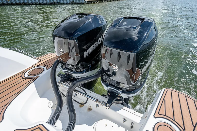  Yacht Photos Pics 2018 Boston Whaler 270 Vantage with dual Mercury outboard engines on water.