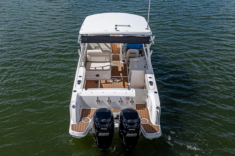  Yacht Photos Pics 2018 Boston Whaler 270 Vantage boat with dual engines on water.