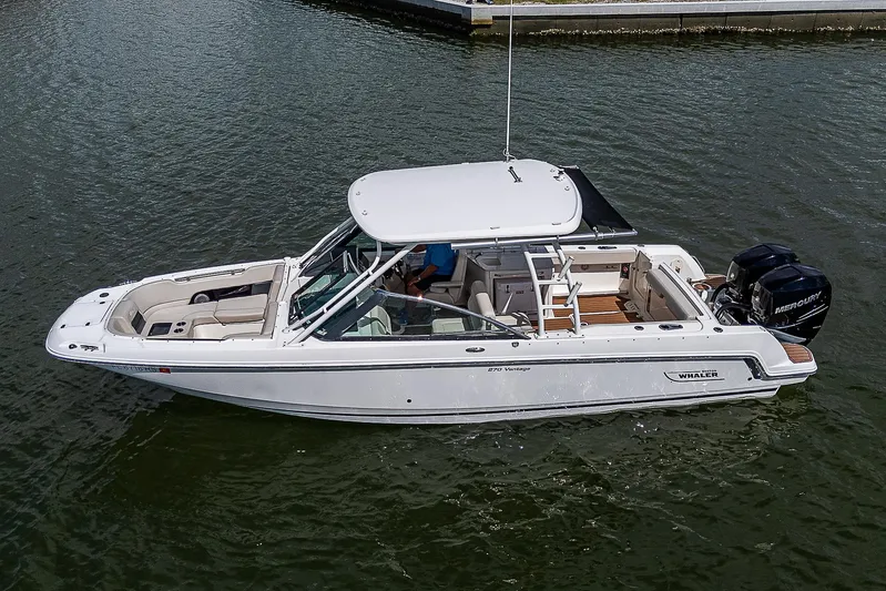  Yacht Photos Pics 2018 Boston Whaler 270 Vantage boat on water, side view.