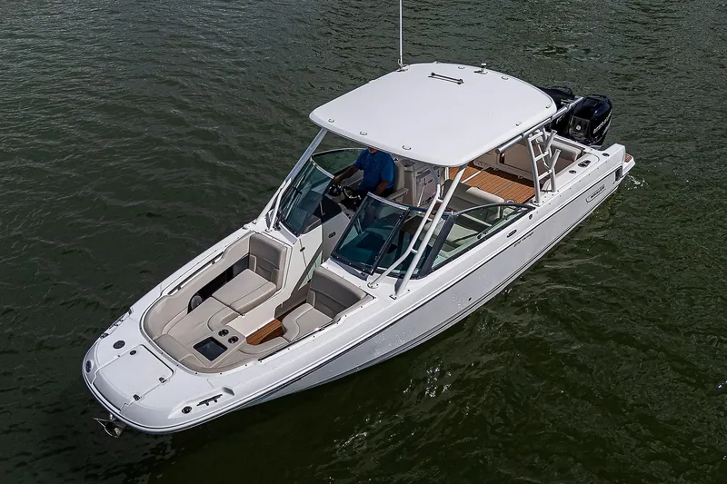  Yacht Photos Pics 2018 Boston Whaler 270 Vantage boat on water, aerial view.
