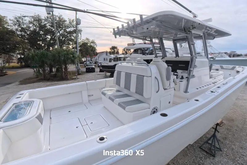 Foolish Pleasure Yacht Photos Pics 2025 Invincible 39 Open Fisherman boat with spacious seating and modern design.