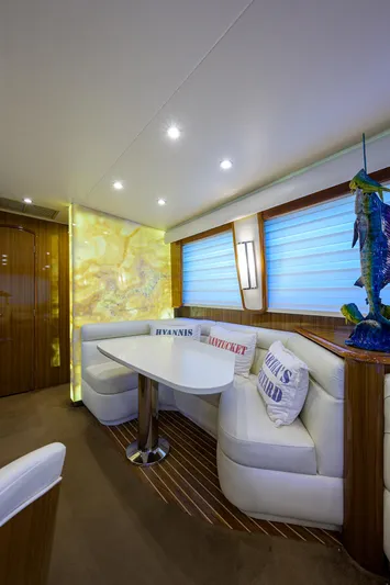  Yacht Photos Pics Luxurious 2007 Viking Enclosed Bridge yacht interior with elegant seating and decor.