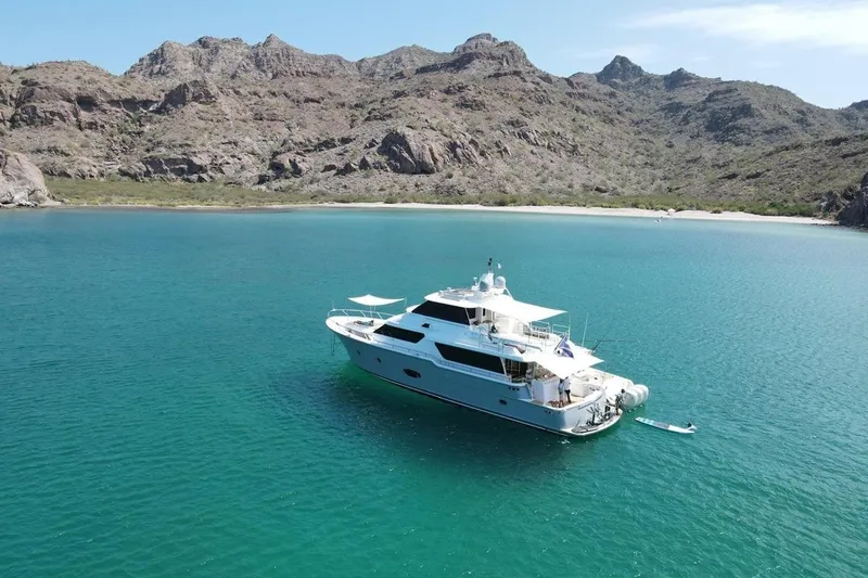 3w Yacht Photos Pics Luxurious 2010 Horizon 74 Motoryacht anchored in scenic coastal waters.
